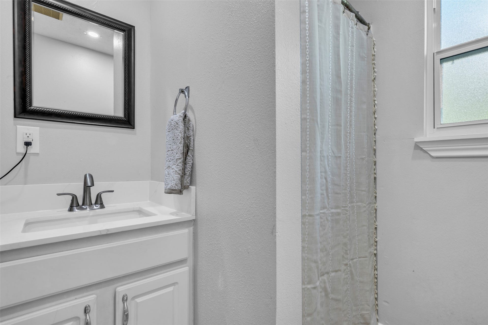 Bath with a stand up shower