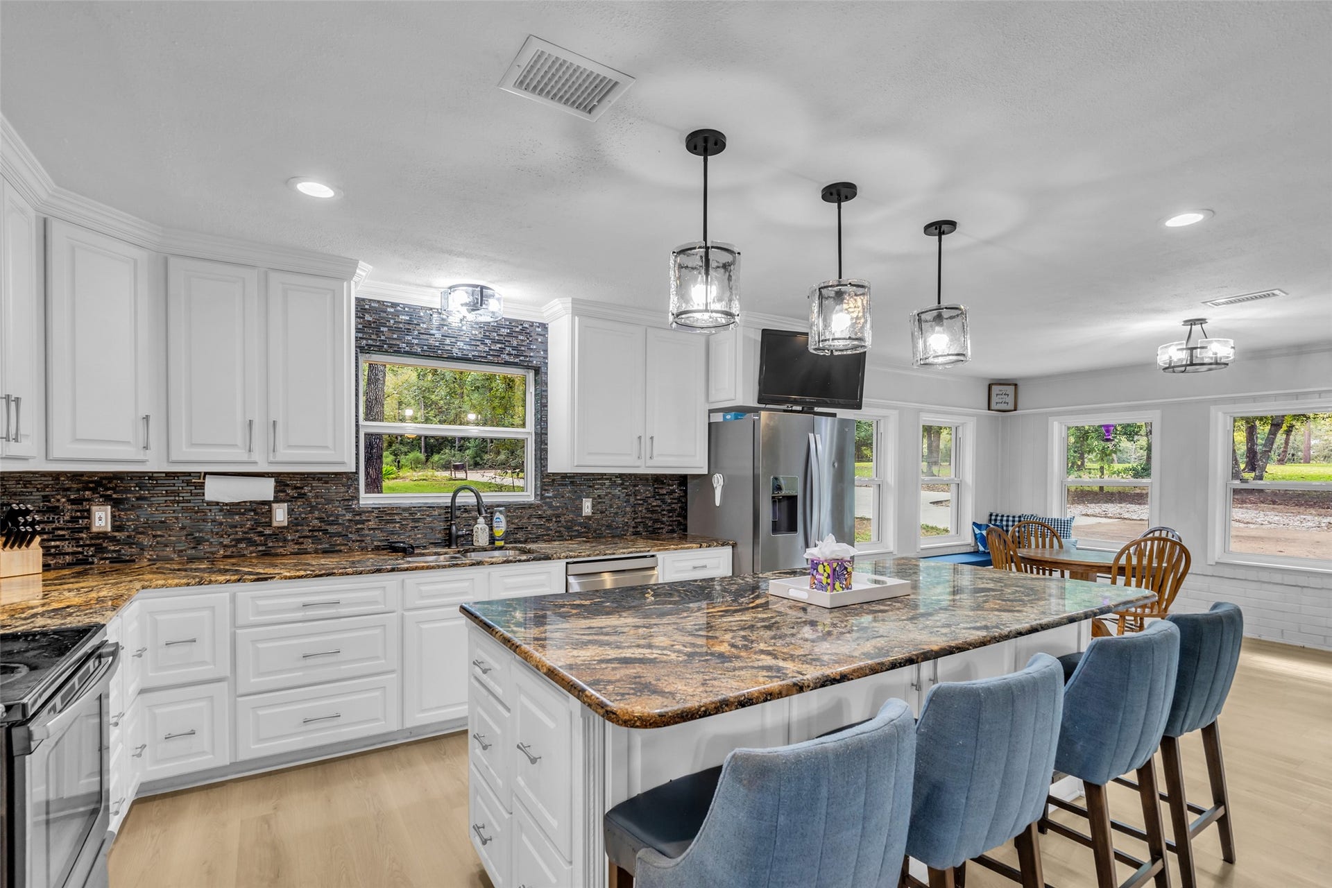 Kitchen centerpiece island has storage all way around