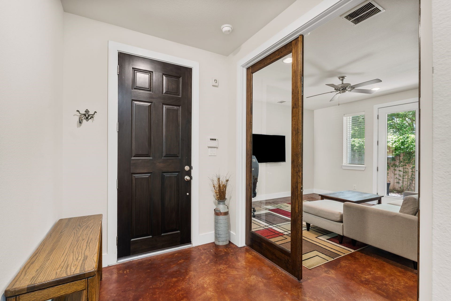 From the moment you enter, youll notice the thoughtful layout, starting with a first-floor bedroom that offers total flexibility.