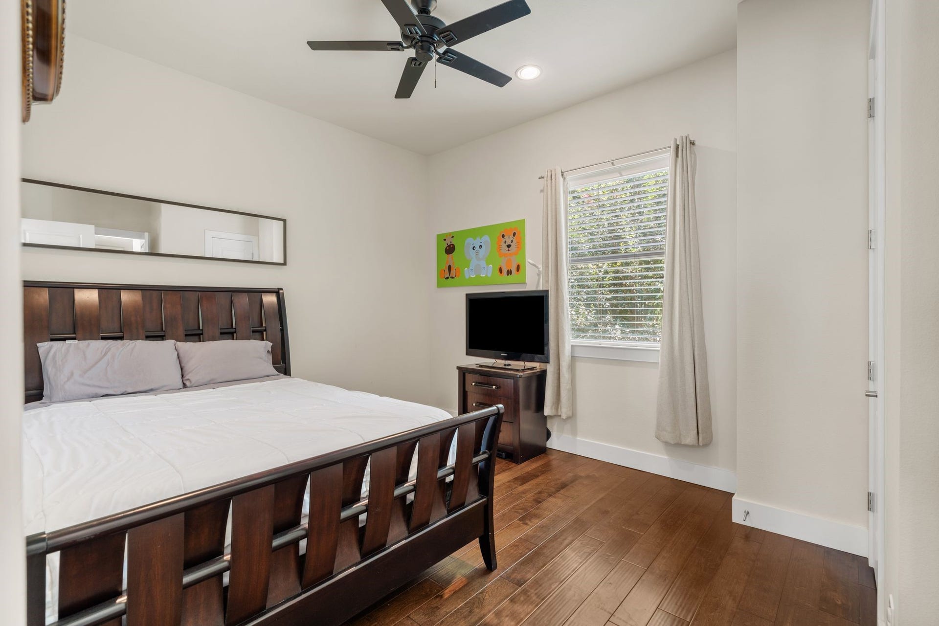 A second bedroom with its own ensuite bathroom and generous closet space is also tucked away on this level.