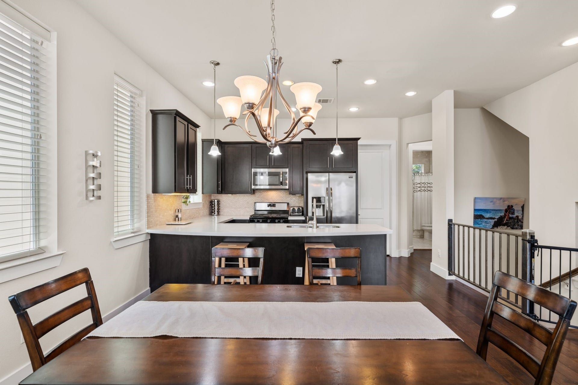 Central to this level is the elegant dining space, designed to be the anchor for your social life.