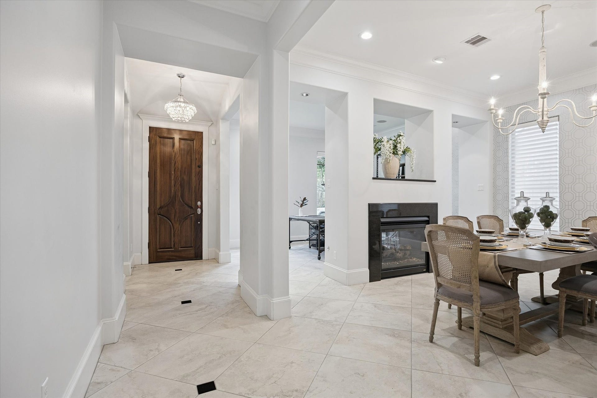 4022 Coleridge Street, West University Place, TX 77005 Beautiful sightline from the dining area toward the entry, showcasing the home's open layout and natural light.