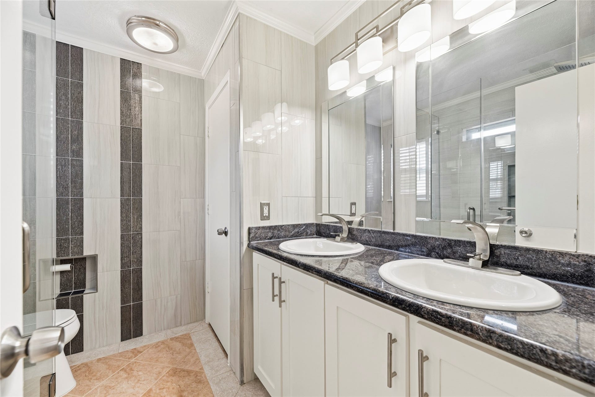 18502 Bridoon Drive, Cypress, TX 77433 Updated primary bathroom with a dual sink vanity.