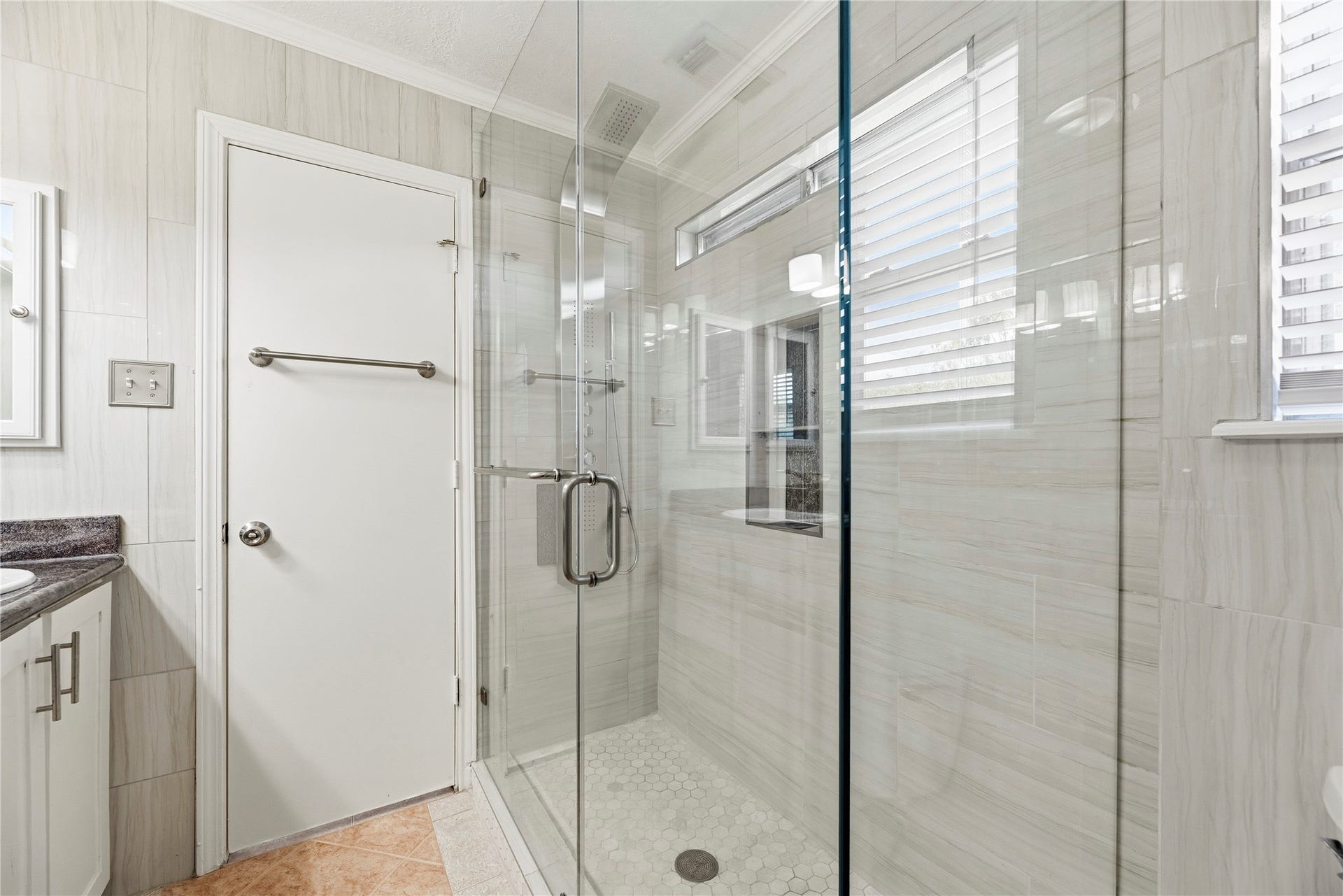 18502 Bridoon Drive, Cypress, TX 77433 Oversized frameless shower in the primary.