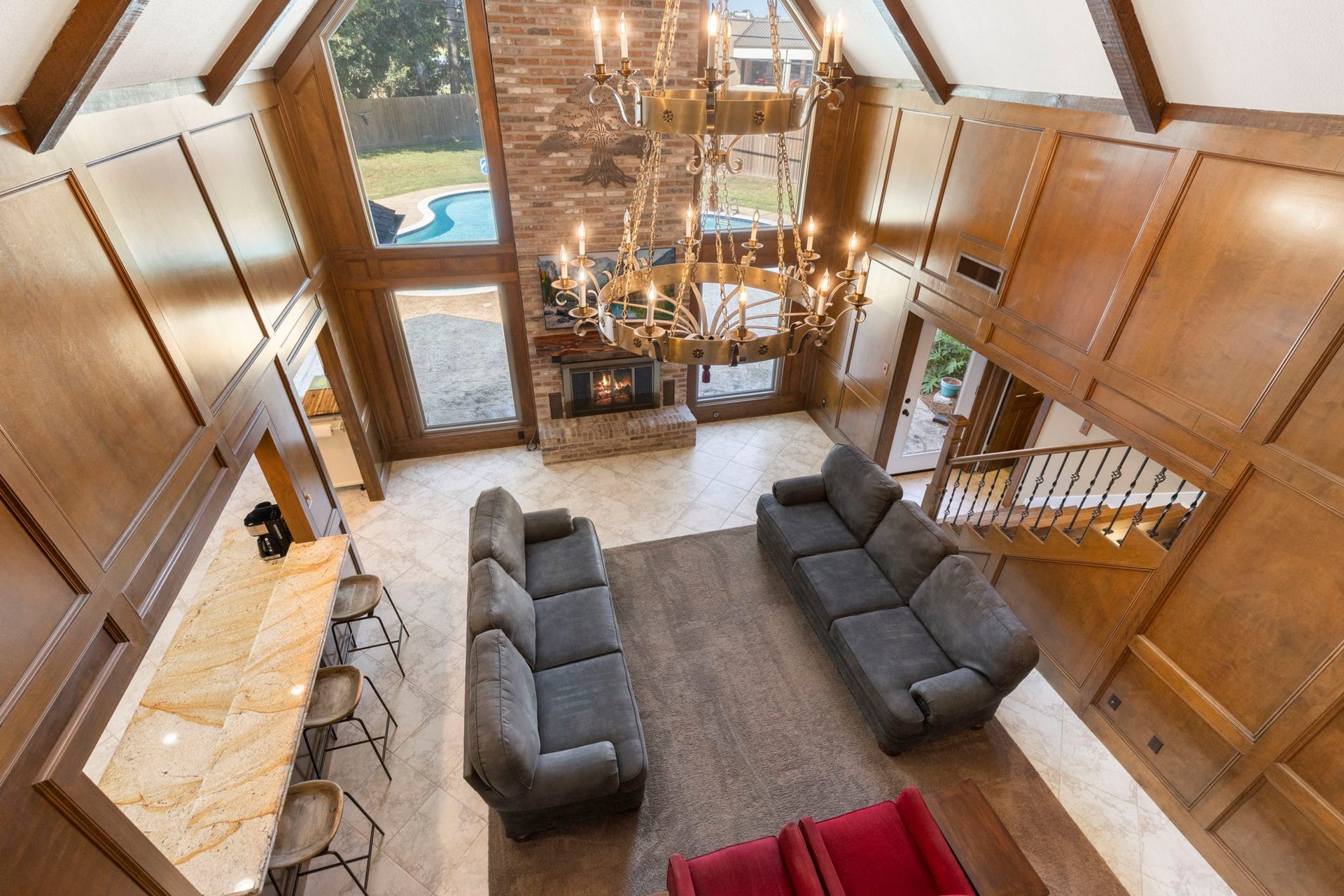 8202 Forest Ridge Road, Spring, TX 77379 High vaulted ceilings with exposed beams set this room apart.