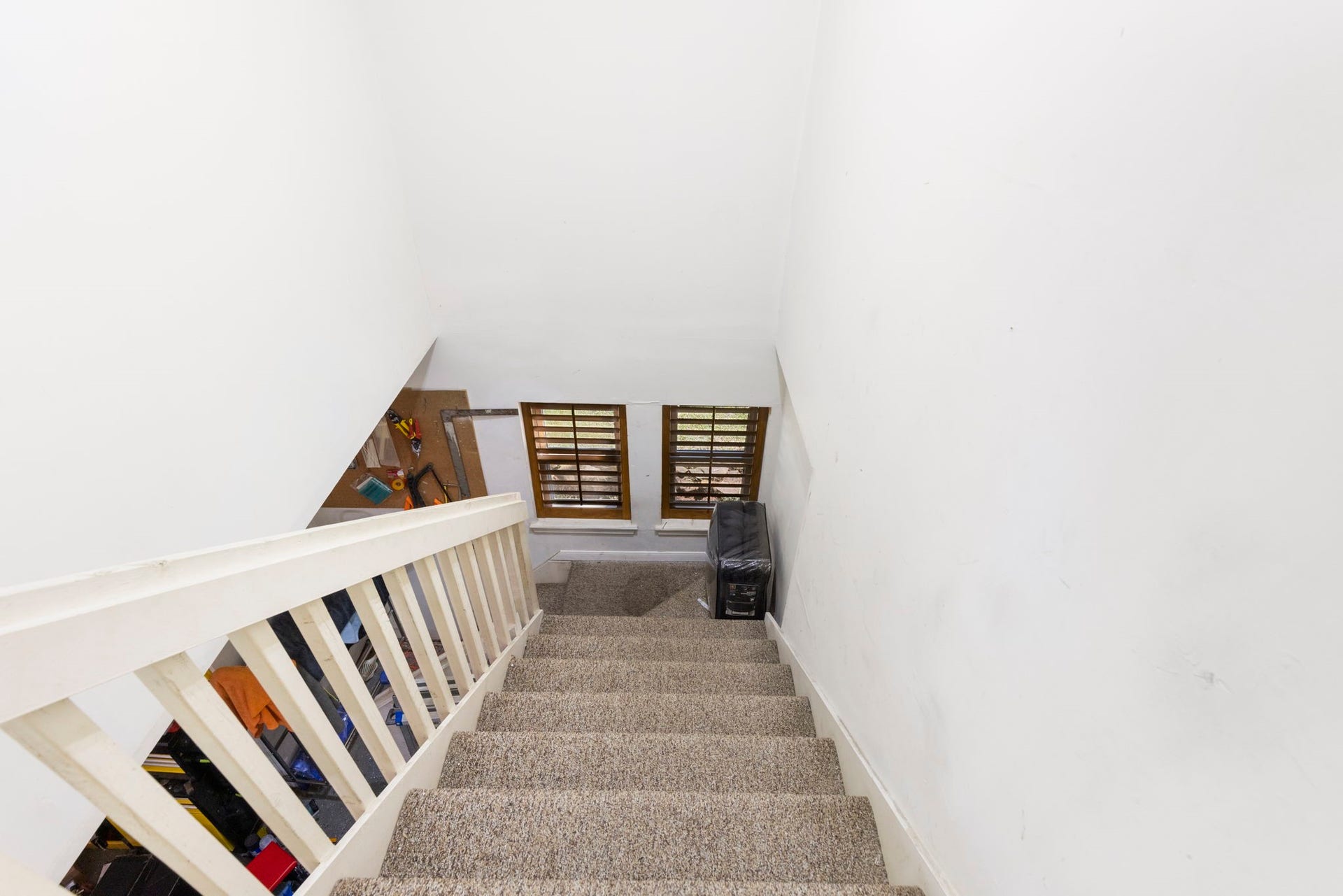 8202 Forest Ridge Road, Spring, TX 77379 This staircase leads from the gameroom down to the extensive garage creating a private garage access to the upstairs.