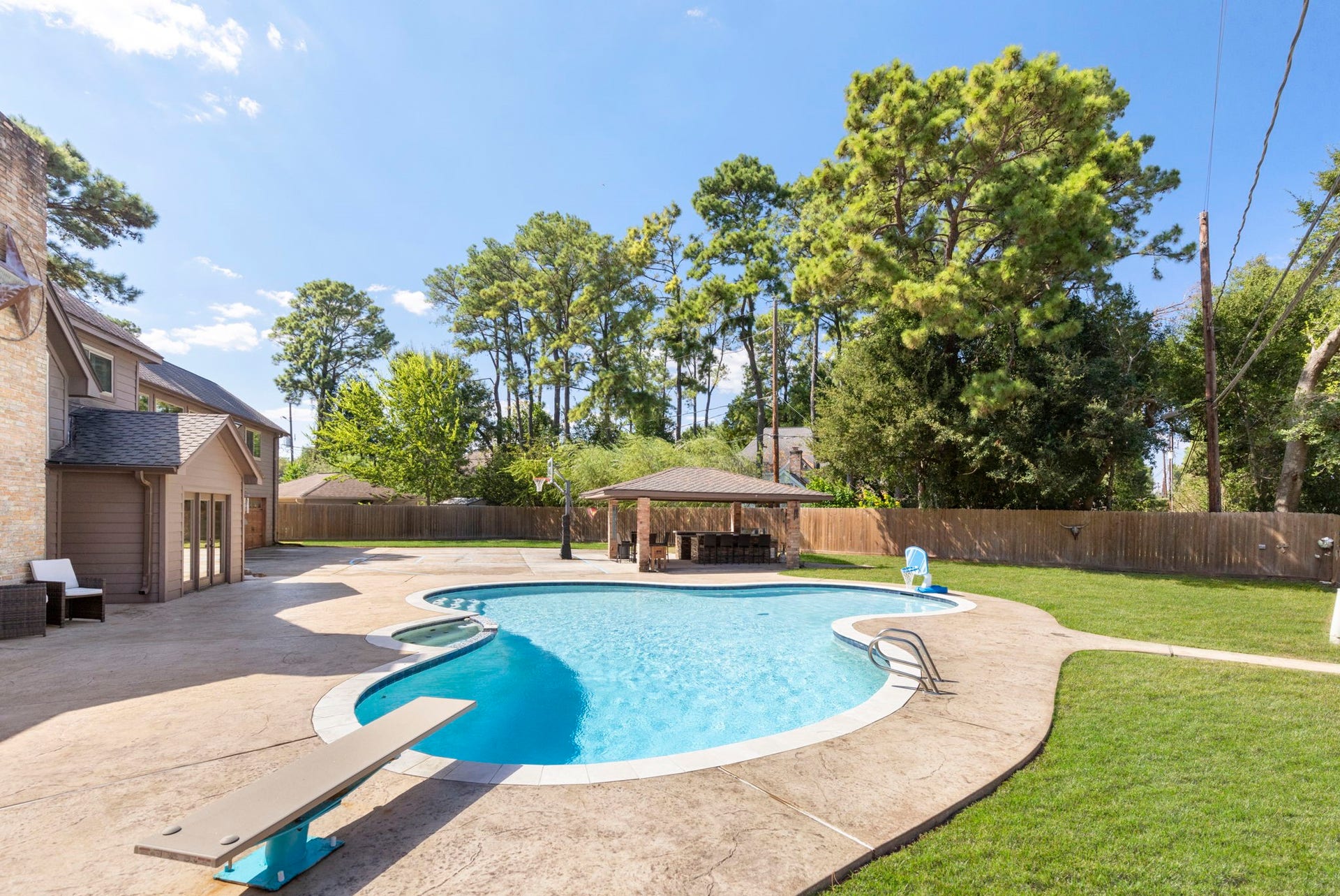 8202 Forest Ridge Road, Spring, TX 77379 What is not to love about this backyard that was literally designed to provide something for everyone, and all the ages.