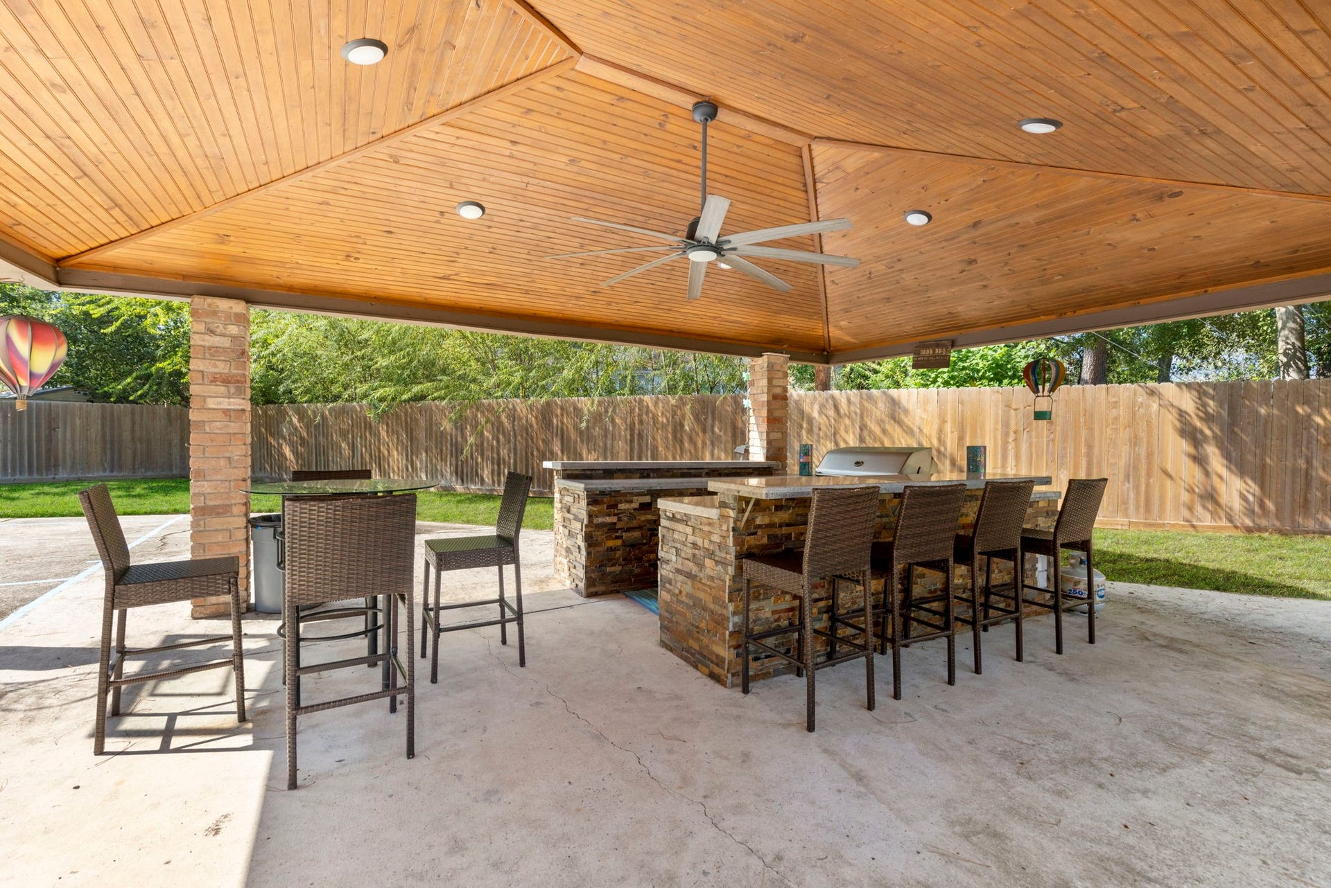 8202 Forest Ridge Road, Spring, TX 77379 This huge covered summer kitchen area has incredible details and provides the best outdoor spot, come rain or shine.