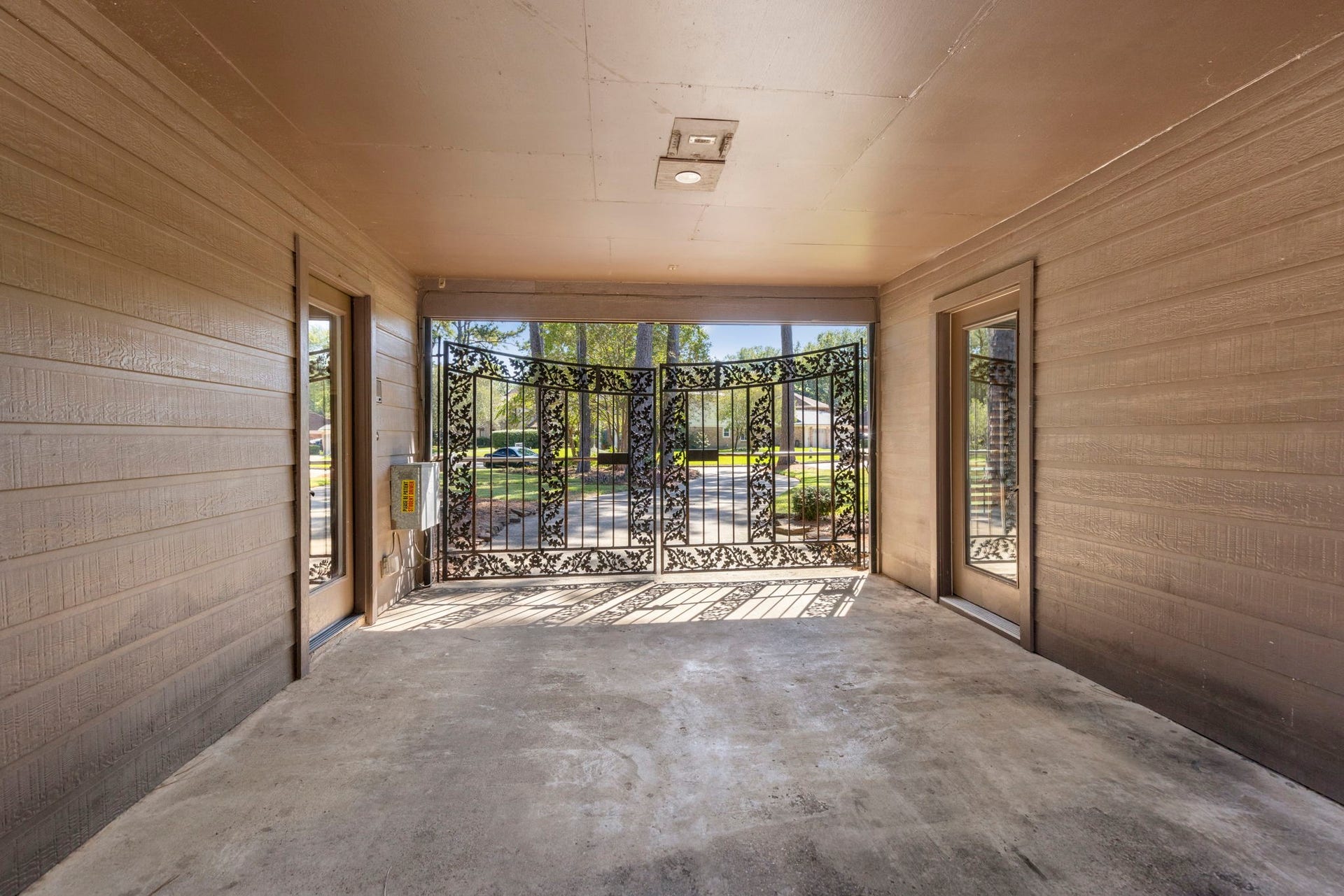 8202 Forest Ridge Road, Spring, TX 77379 Porte Cochere provides extended covered area between the house and the garage great for additional parking, hosting etc.
