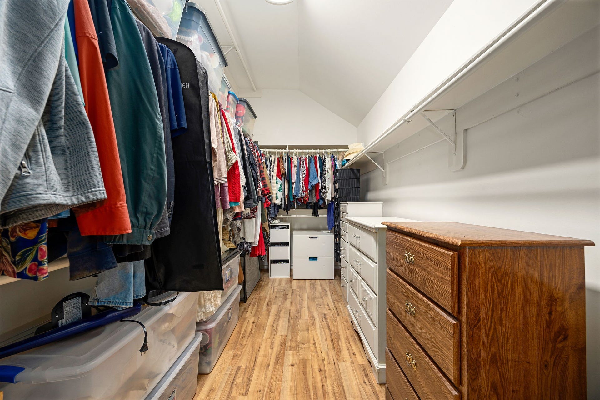 8327 E Copper Village Drive, Houston, TX 77095 The primary suites walk-in closet offers generous space to keep everything organized and within reach.