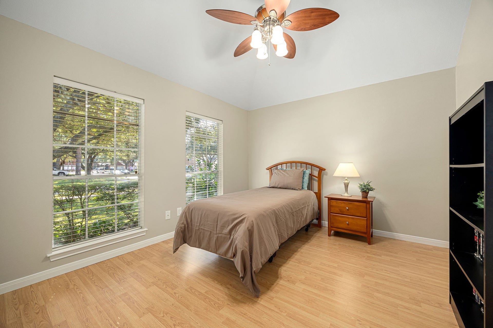 8327 E Copper Village Drive, Houston, TX 77095 A secondary bedroom offers a bright, versatile layout, easily suited for a guest room, home gym, or active lifestyle space.