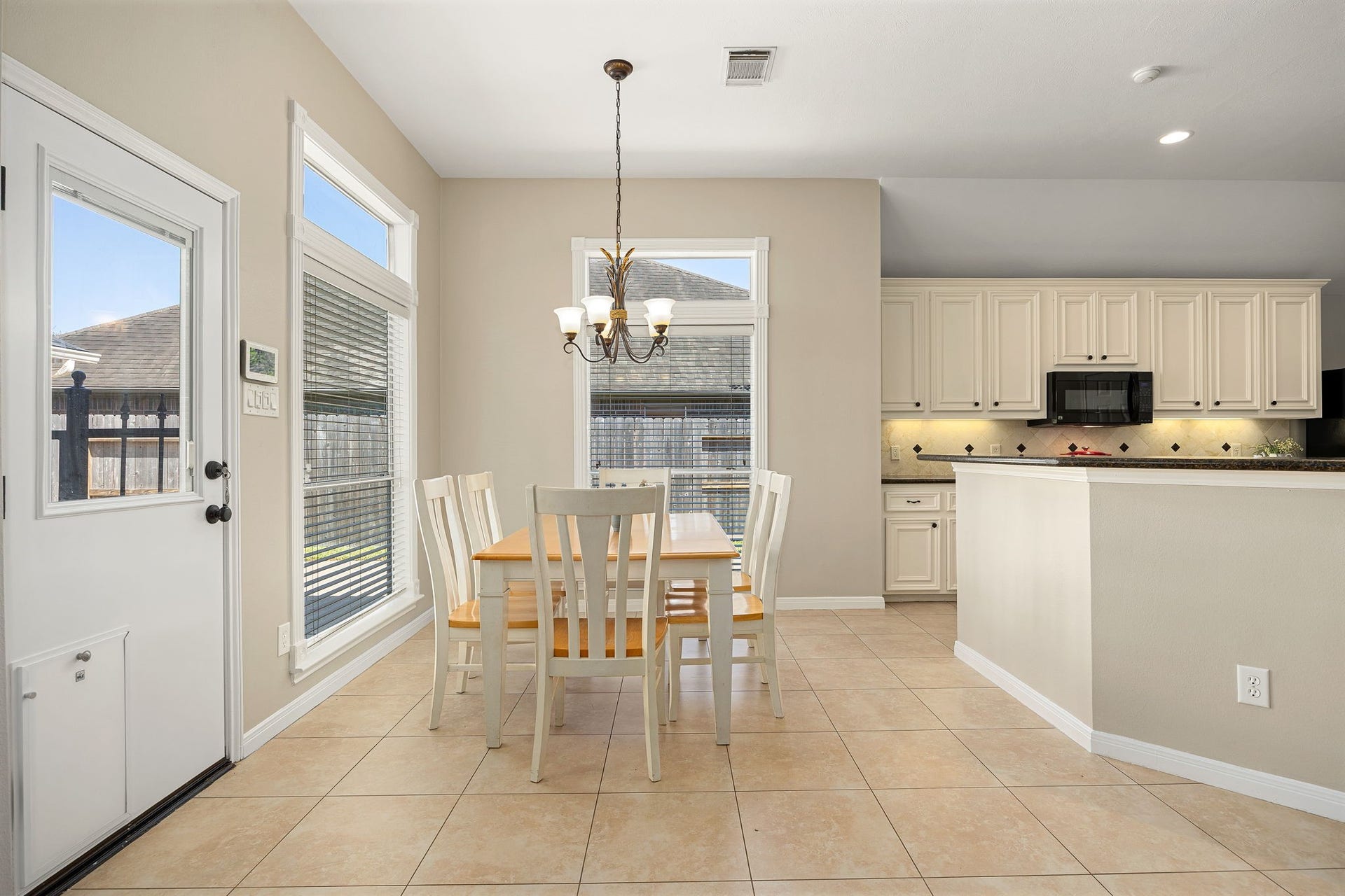8327 E Copper Village Drive, Houston, TX 77095 The breakfast area sits just off the kitchen, offering a sunny spot for casual dining with easy backyard access.