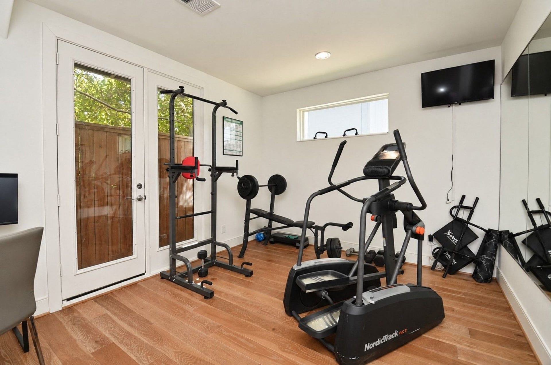 2414 Canal Street, #A, Houston, TX 77003 Secondary bedroom on first floor with ensuite bath used as a work out room.
