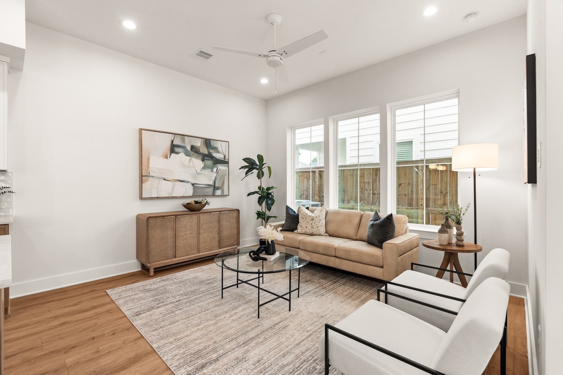 Generous living area providing flexible space for oversized seating and entertainment setups.