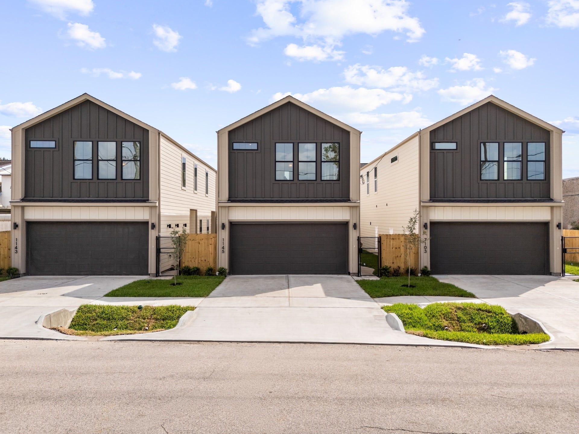 Sleek modern facade offering dedicated off-street parking and easy inner-loop convenience.