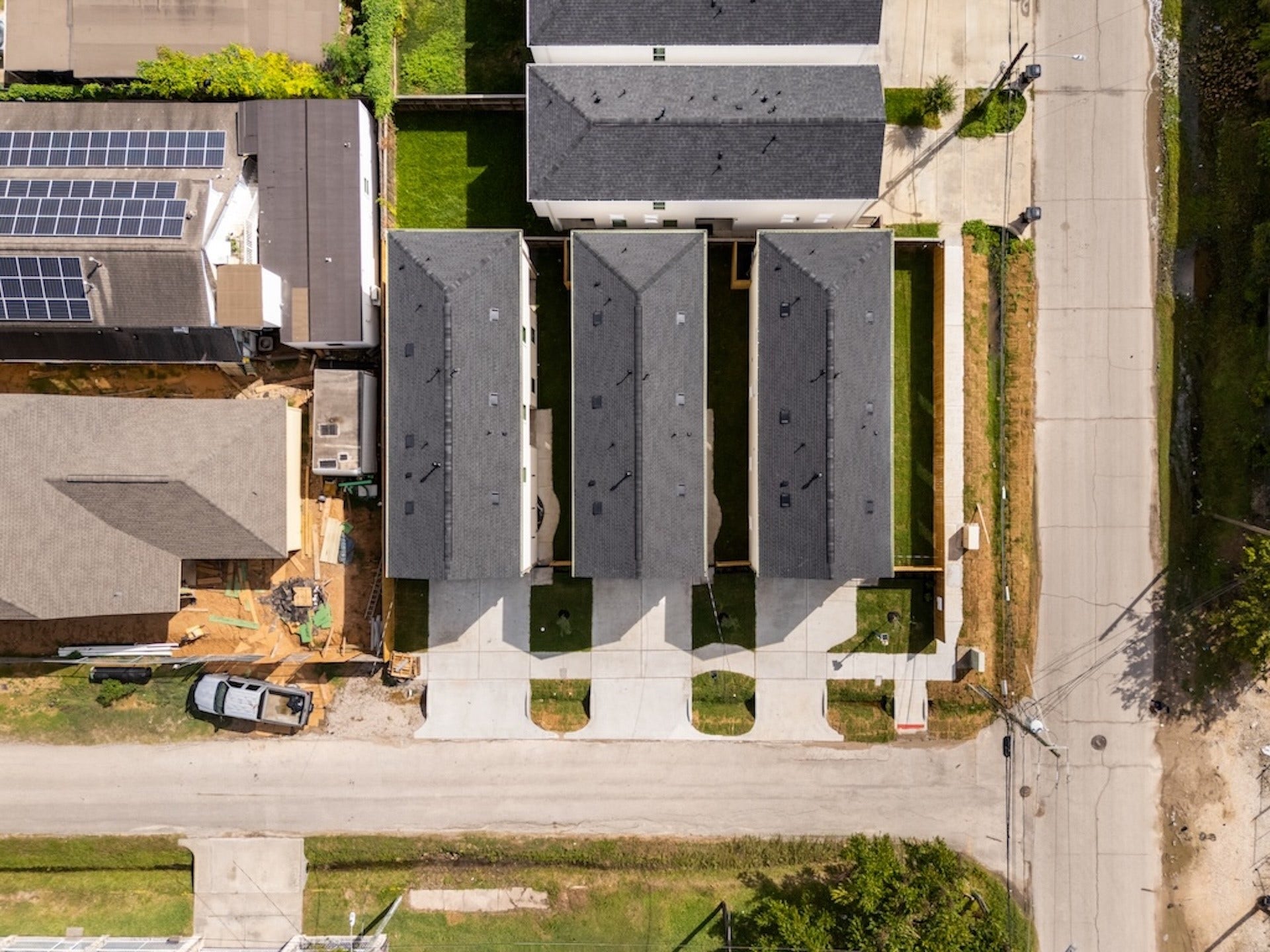 Well-planned site layout offering private driveways and dedicated yard space.