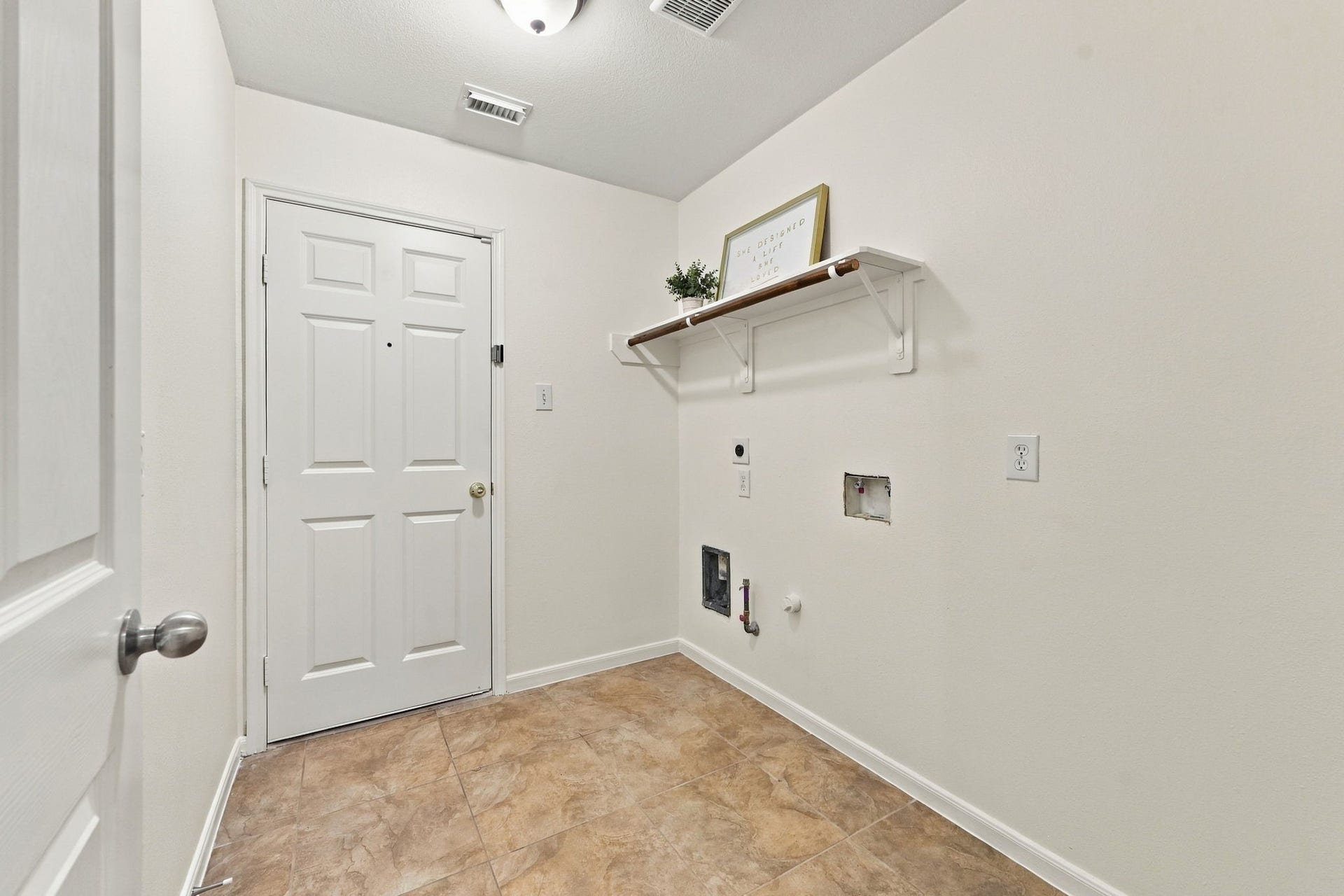 The spacious Laundry Room offers direct access to the oversized 2-Car Garage, with plenty of room for a full-size washer and dryer, as well as an additional refrigerator. A gas line is also available, providing flexibility for either a gas or electric dryer.