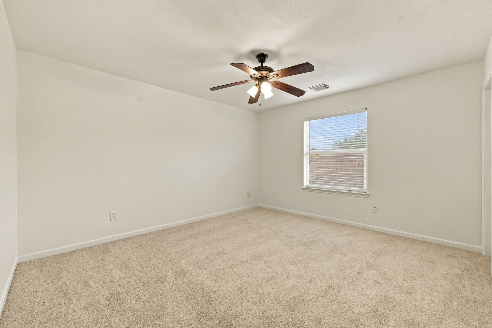 This spacious fourth Bedroom is located on the second floor and offers convenient access to a Full Bath, making it an ideal private retreat for family members or guests. The room features fresh paint, newly installed carpet, and an oil-rubbed bronze five-blade ceiling fan.