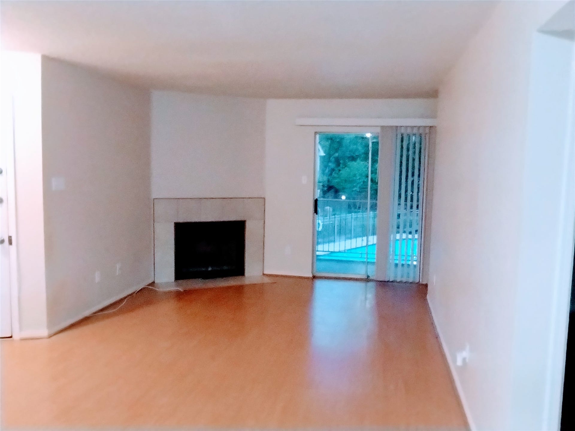 11201 Lynbrook Drive, #3807, Houston, TX 77042 The front door (on the left) opens to a gracious LIVING ROOM with neutral laminate flooring.