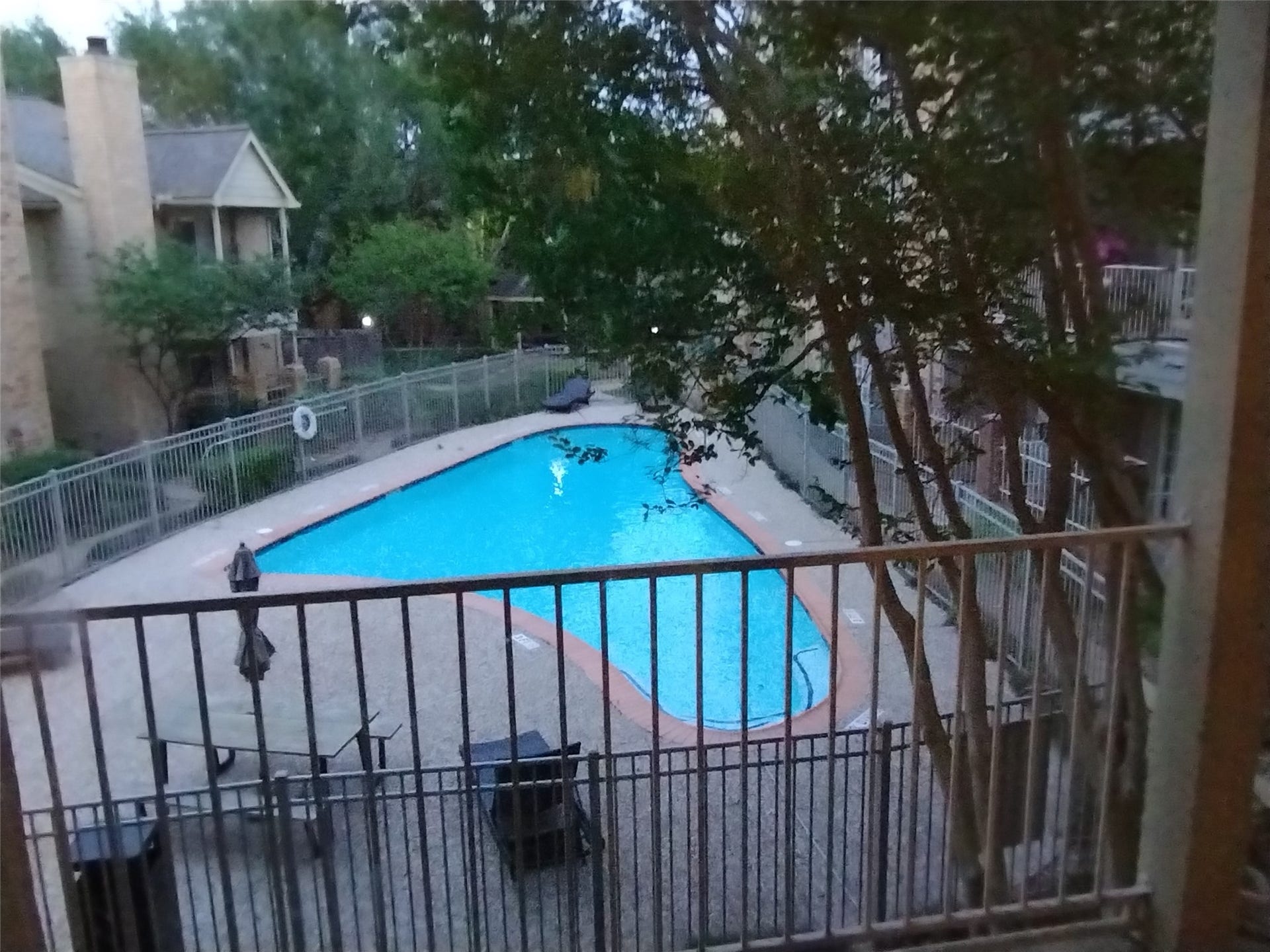 11201 Lynbrook Drive, #3807, Houston, TX 77042 Here is the VIEW FROM THE COVERED BALCONY/TERRACE at twilight. Come see what 11201 Lynbrook Dr. has to offer!