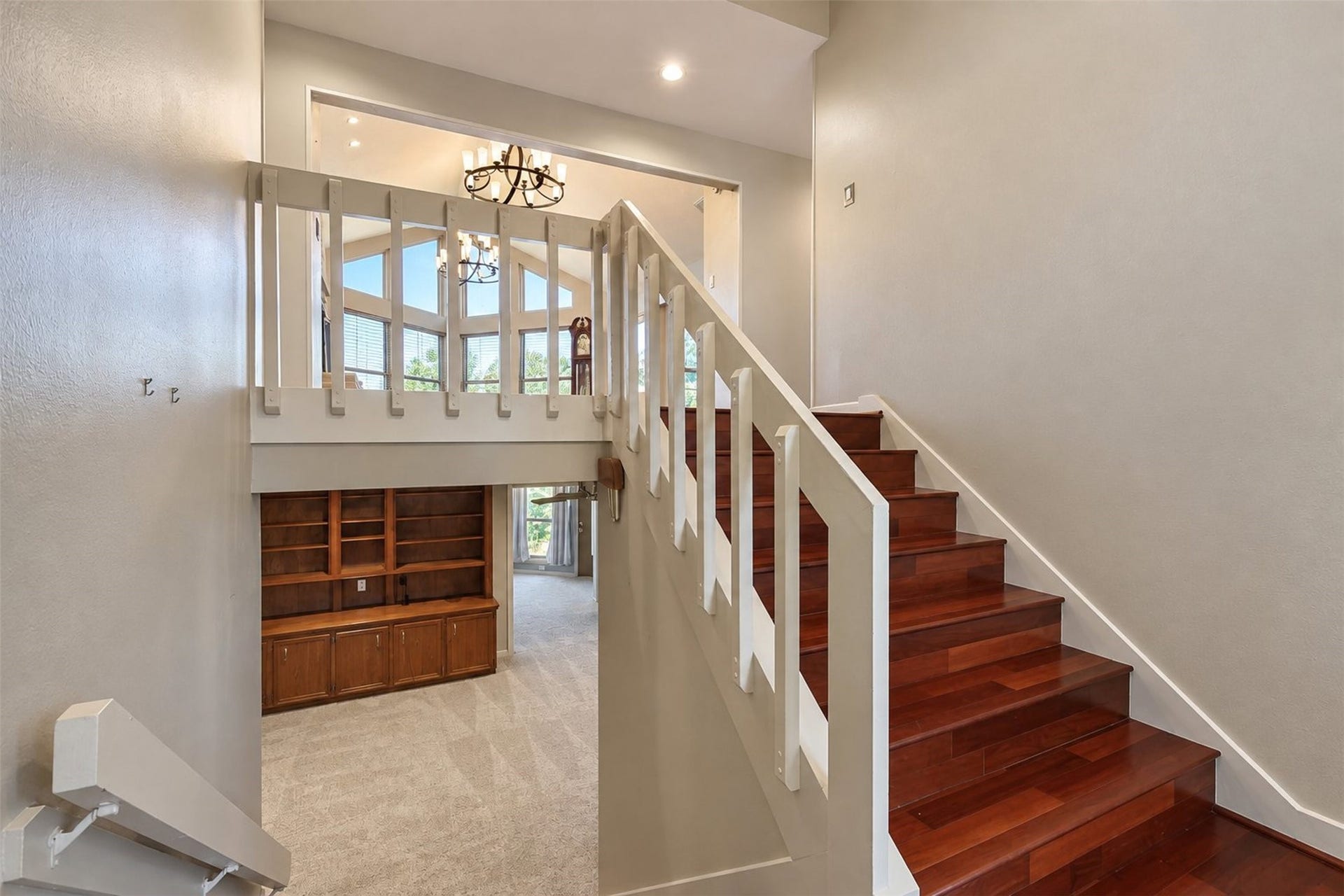 Entry from the front door. Family room and 3 beds down. Master and living areas up.
