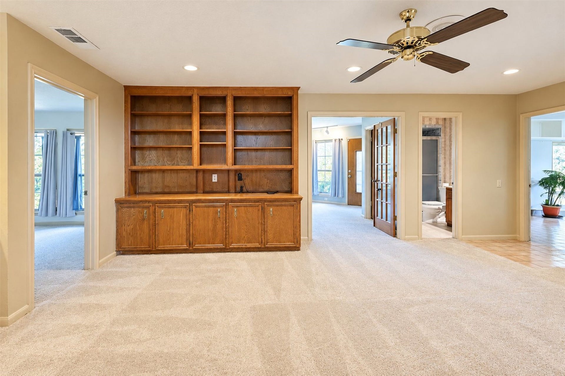 Family room downstairs. New carpet and plenty of built ins.
