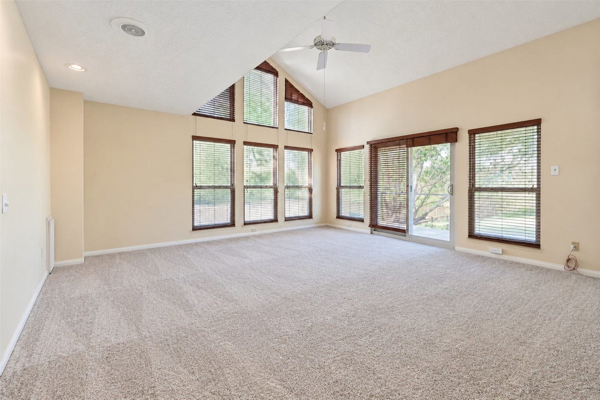 Primary bedroom, upstairs has its own access to a back balcony.