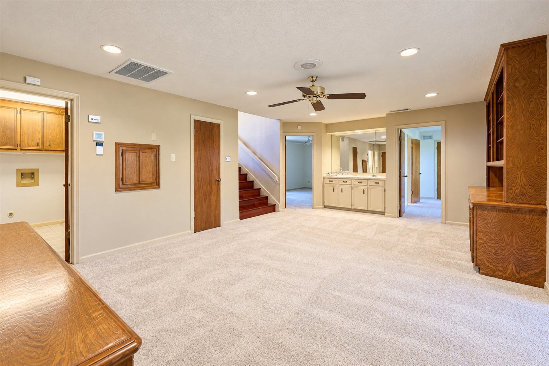 Laundry room is off the family room.  Wet bar at the far end.