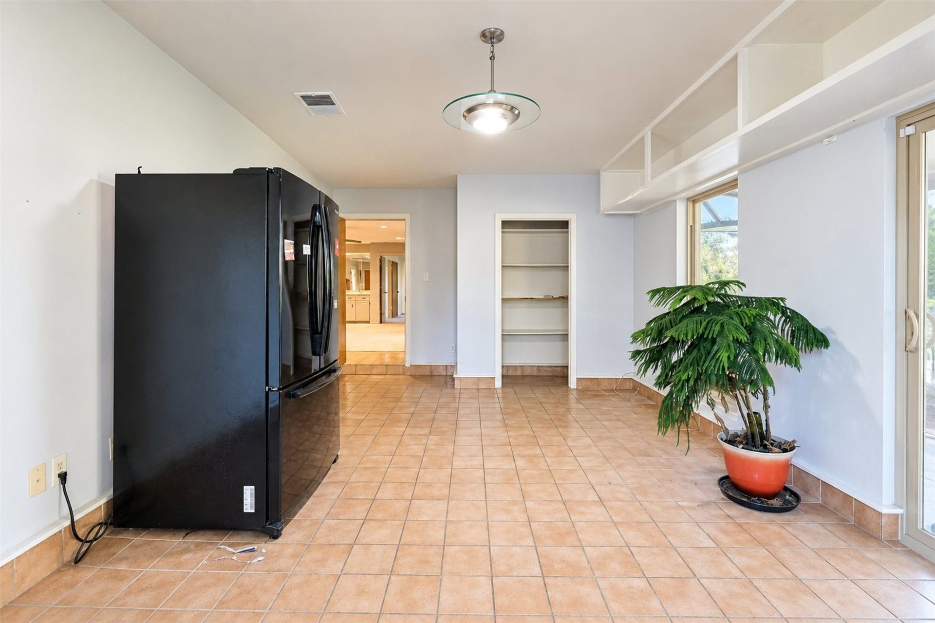 Flex room connects to outside porch.