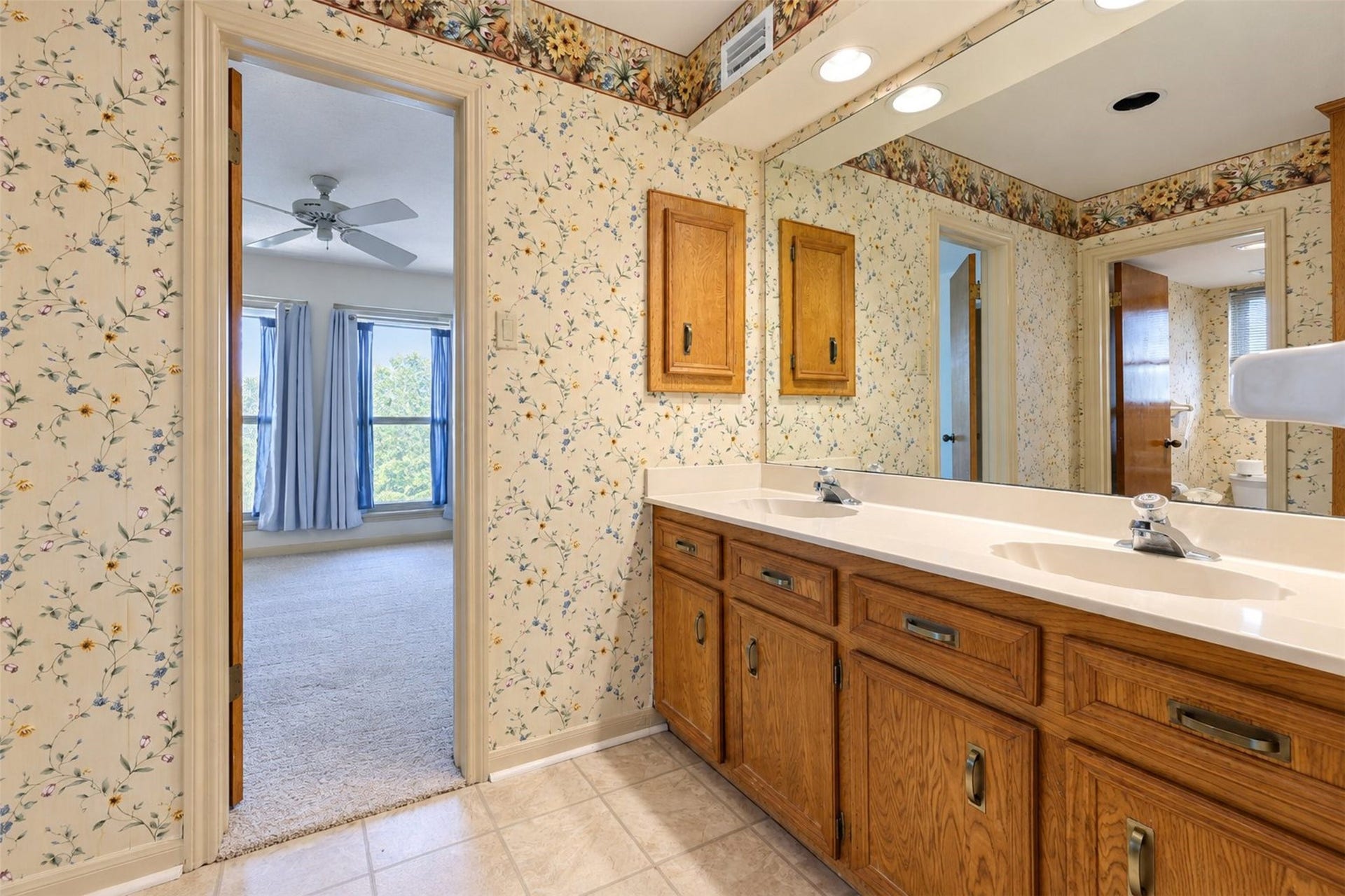 Jack and Jill bath connecting two of the secondary bedrooms.