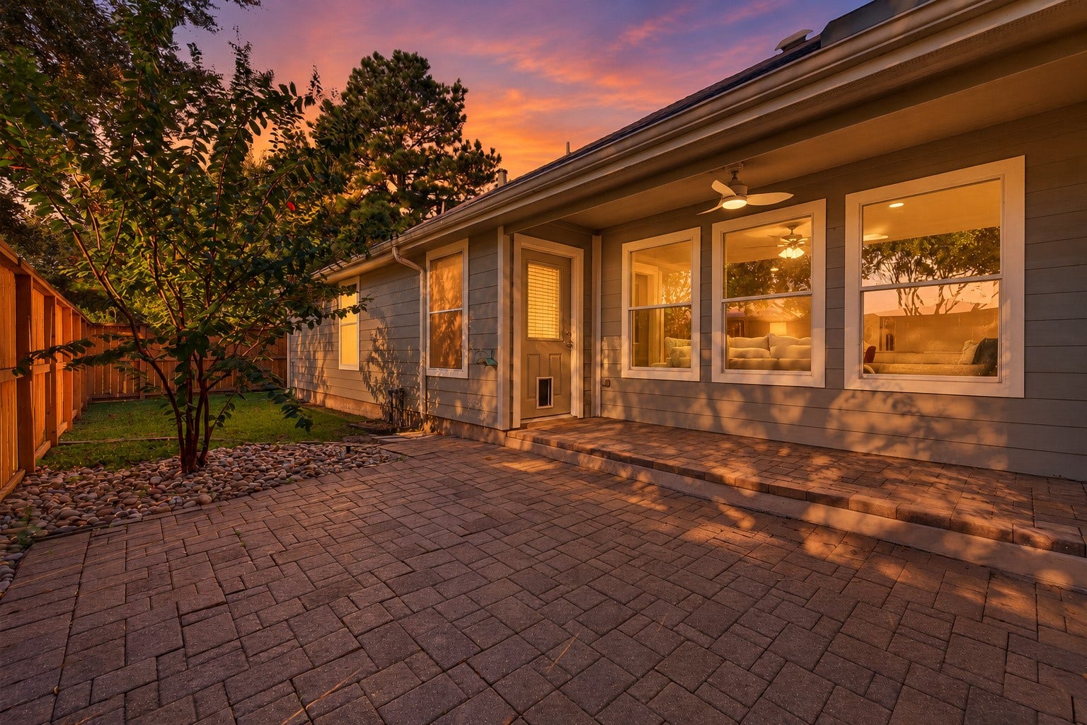 Enjoy relaxing or entertaining in your backyard with no side neighbors. Twilight Virtually Created.