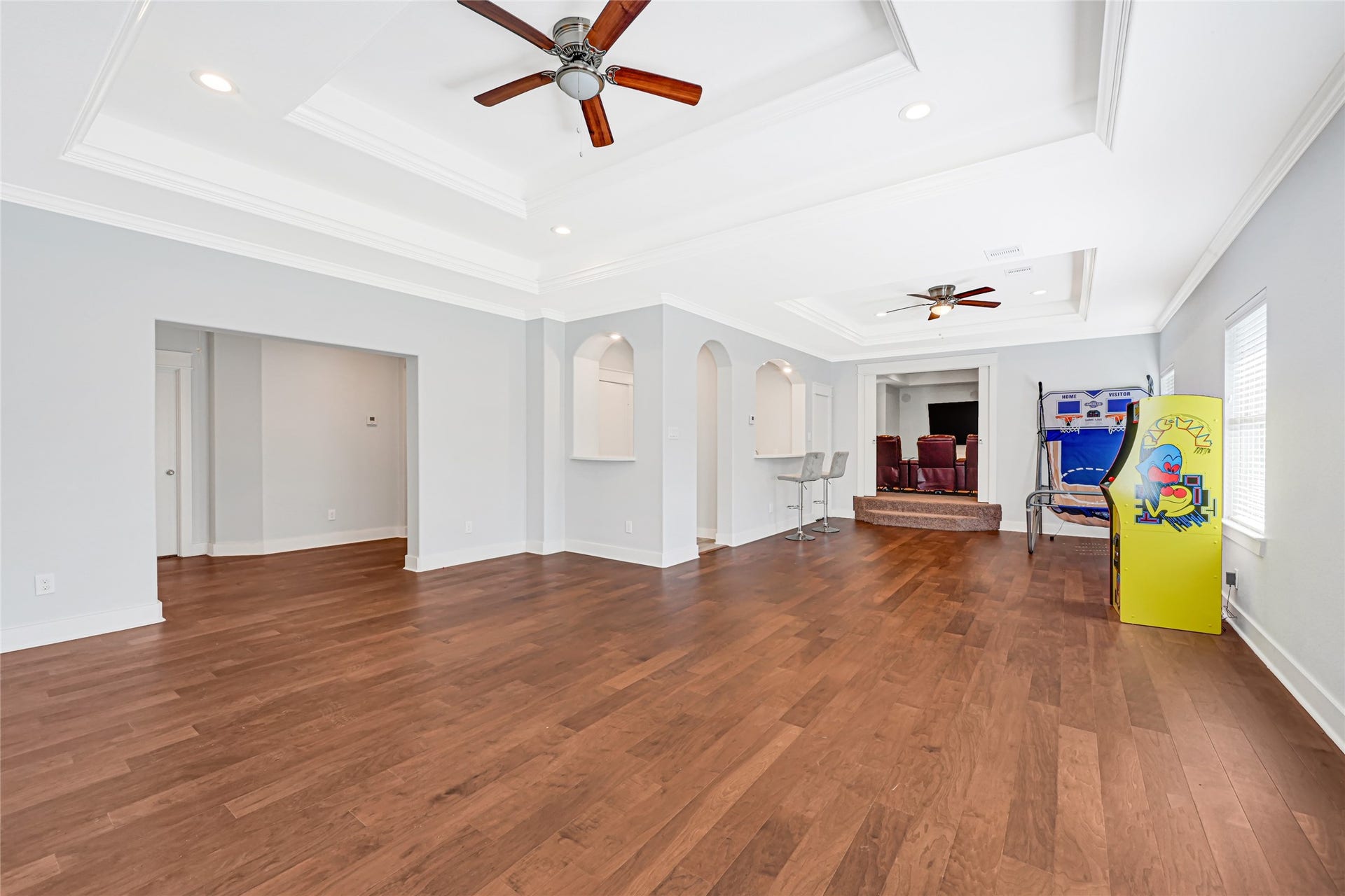 4210 Hidden Winds Drive, Spring, TX 77386 Another view of the spacious upstairs game room highlights wood flooring and plenty of space for games and seating.