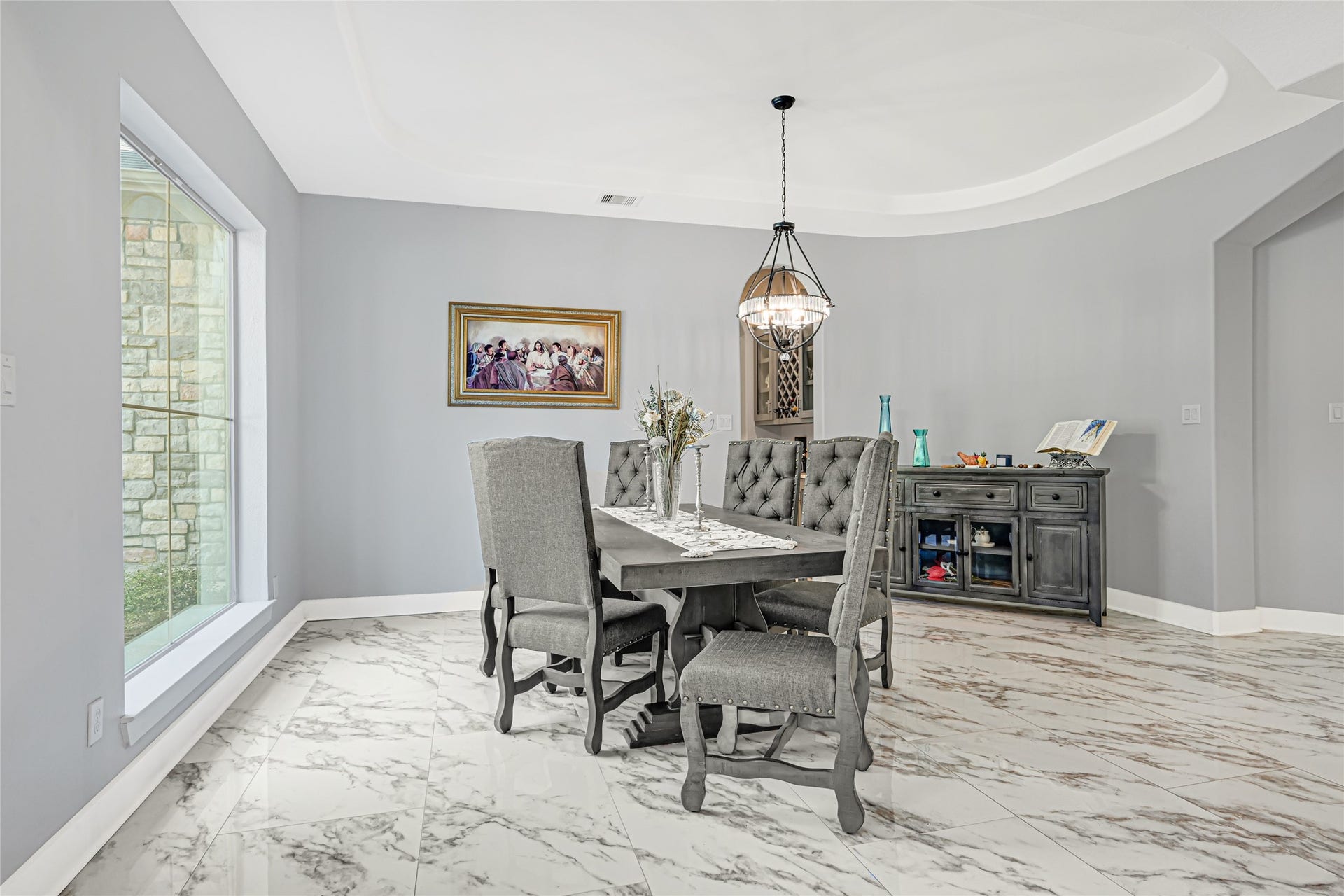 4210 Hidden Winds Drive, Spring, TX 77386 Light-filled formal dining room provides an inviting setting for gatherings.