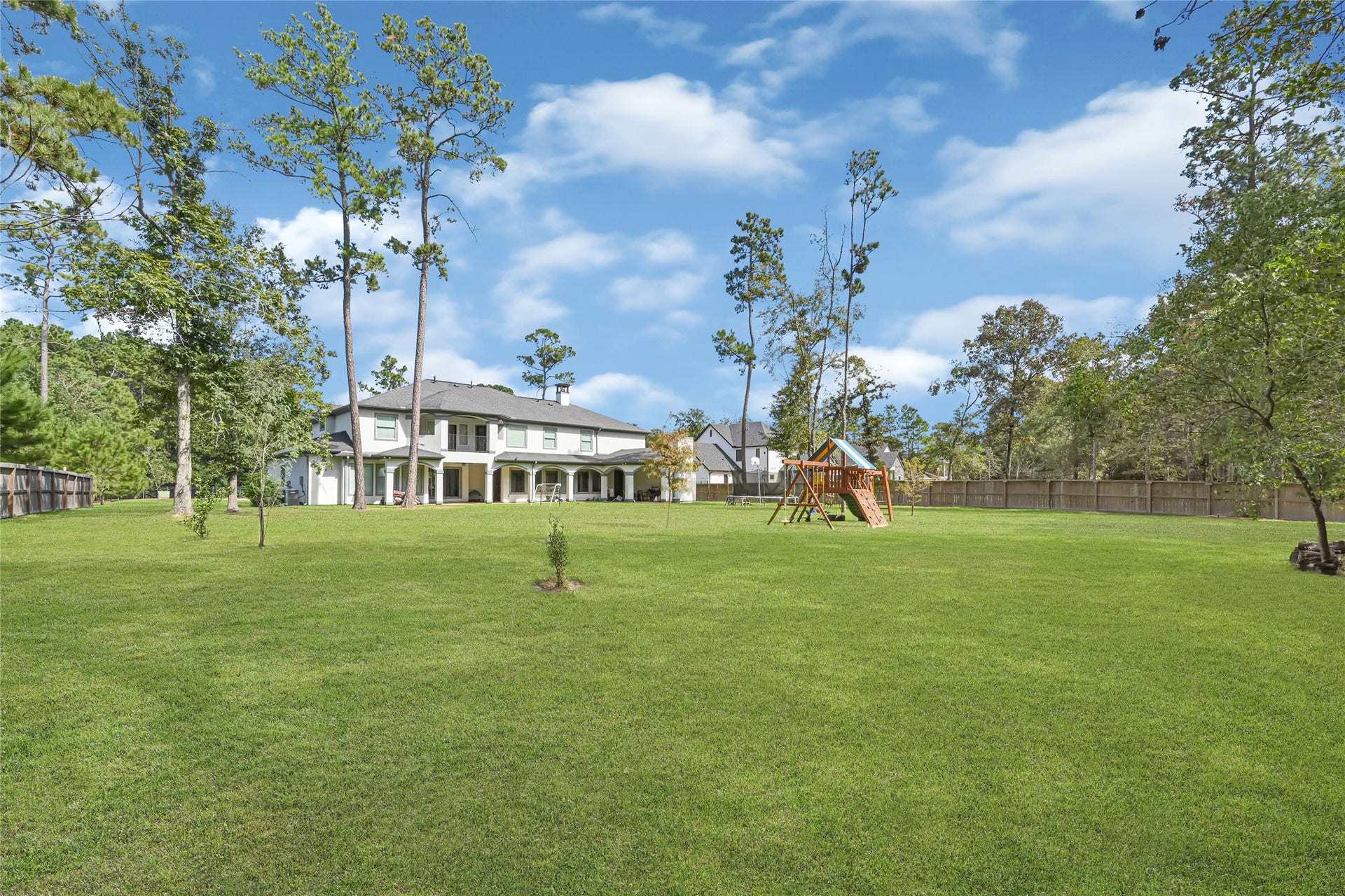 4210 Hidden Winds Drive, Spring, TX 77386 Another view of the generous backyard and outdoor setting.