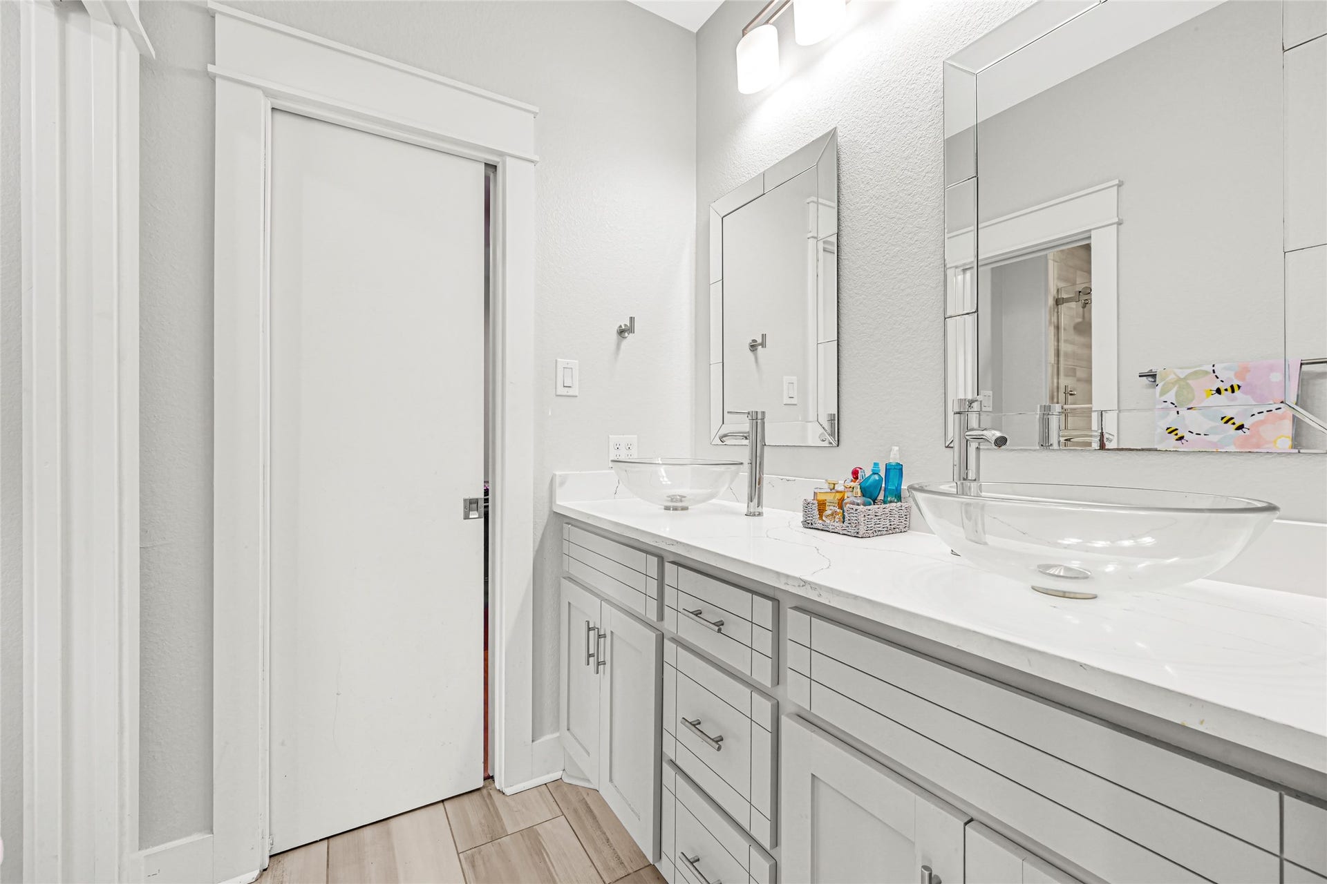 4210 Hidden Winds Drive, Spring, TX 77386 Spacious bathroom vanity with generous counter space, cabinet storage, and a large mirror.