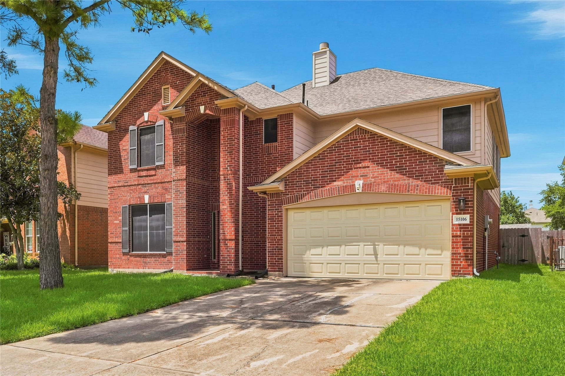 Welcome to 15106 Turphin Way, a beautiful two-story brick home featuring timeless curb appeal, a spacious driveway, and an attached two-car garage.