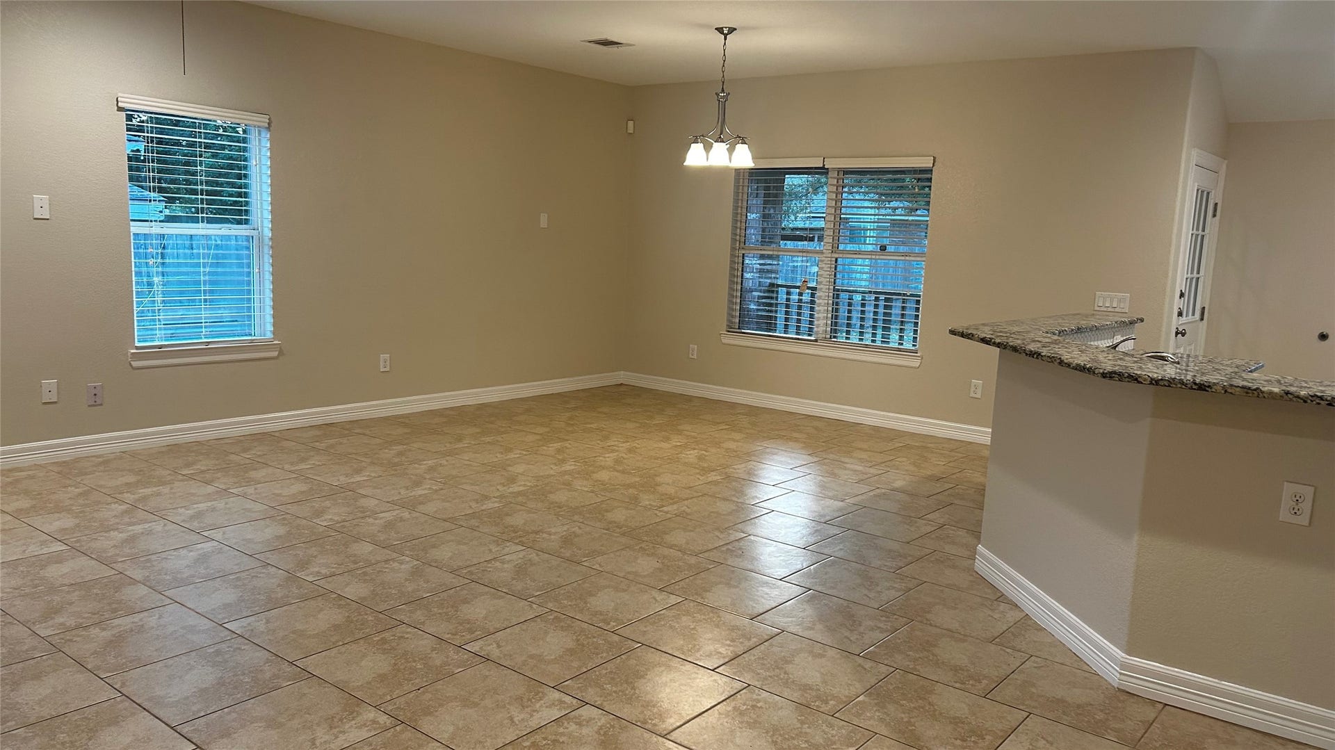 Combination family room and diningl