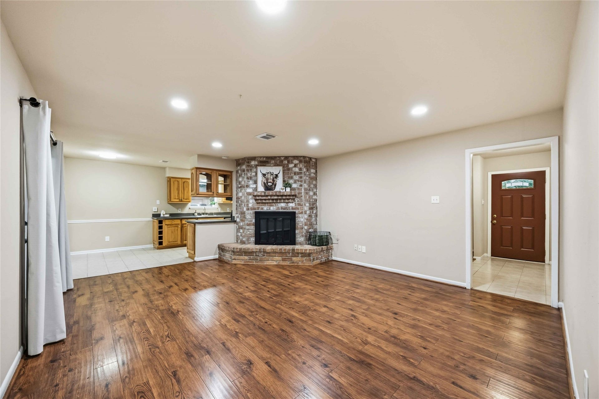 16019 Mill Point Drive, Houston, TX 77059 Family Room to Kitchen and Front Door