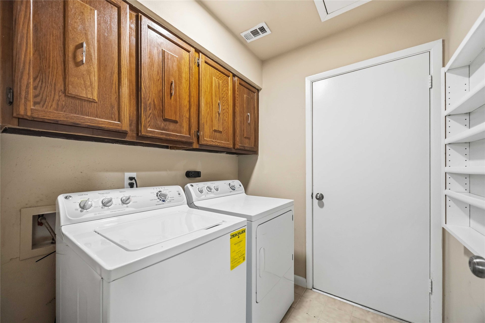 16019 Mill Point Drive, Houston, TX 77059 Laundry Room with entry to Garage