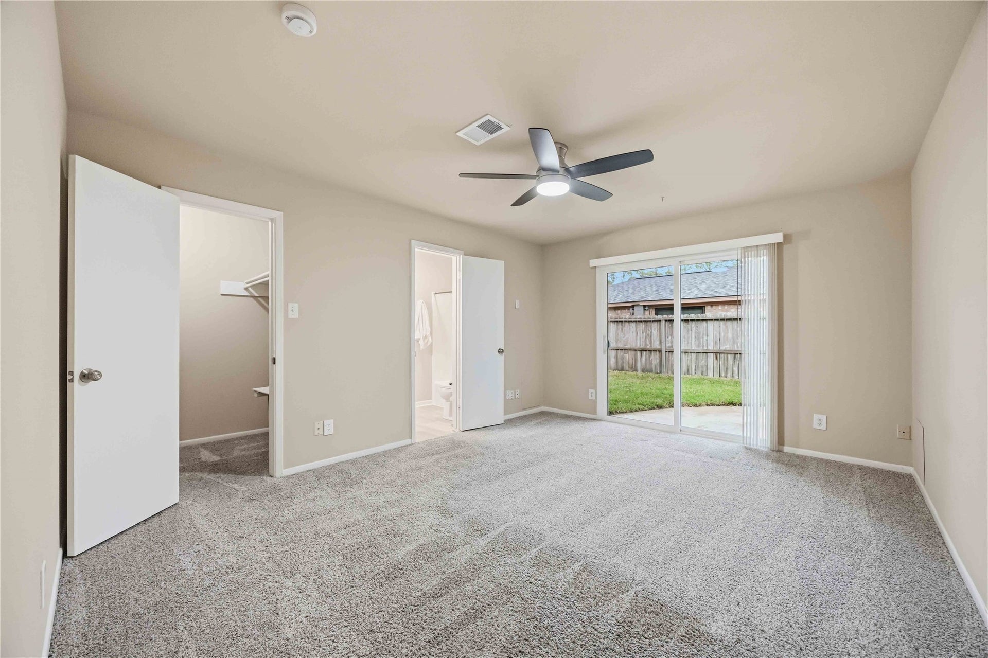 16019 Mill Point Drive, Houston, TX 77059 Primary Bedroom with access to Backyard