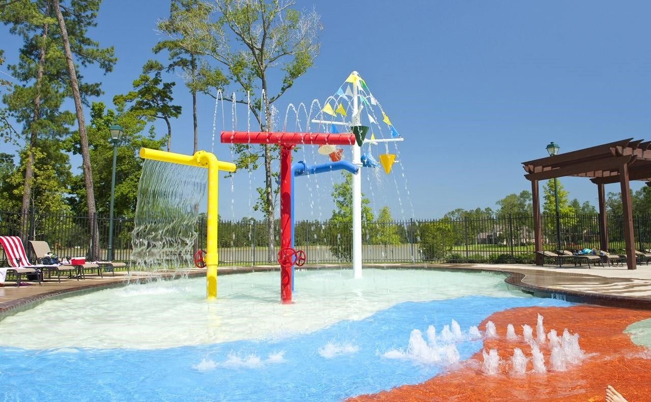 27539 S Lazy Meadow Way, Spring, TX 77386 A Splash Pad is a must for the little ones!