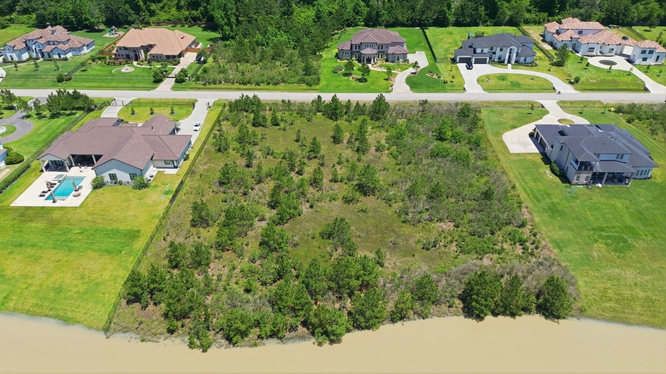 27539 S Lazy Meadow Way, Spring, TX 77386 This Exclusive Community has custom homes sitting on AC lots!