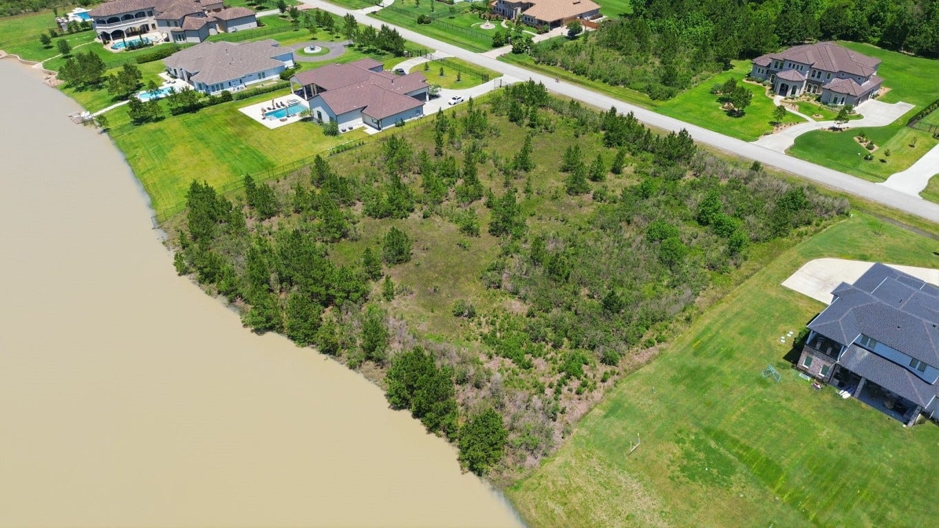 27539 S Lazy Meadow Way, Spring, TX 77386 One of the few remaining Water Fronts Lots!