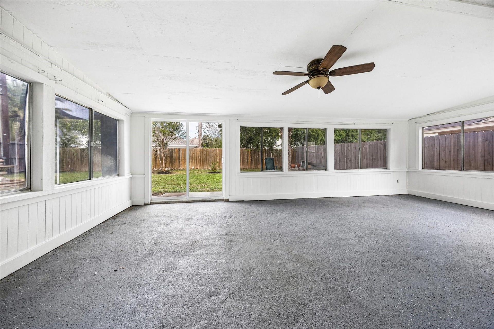21502 River Court Drive, Katy, TX 77449 A versatile indoor patio offering the perfect spot to enjoy your morning coffee, unwind with a good book, or create an inviting space to gather with family and friends.