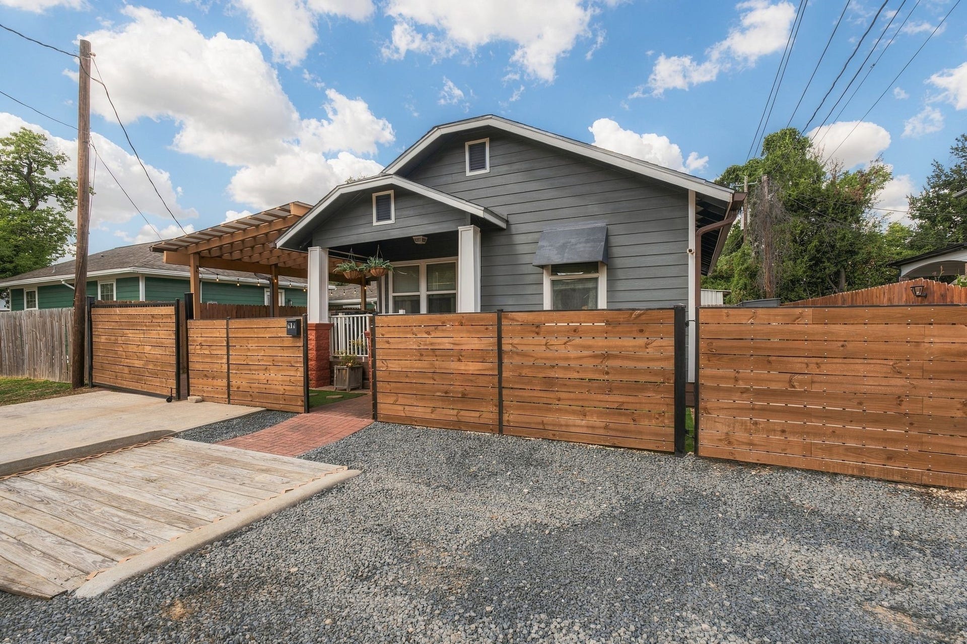 614 Coronado Street, Houston, TX 77009 A standout feature for Inner Loop living! Additional front parking pad complements the gated double-wide driveway and covered carport, providing convenient off-street parking for multiple vehicles.