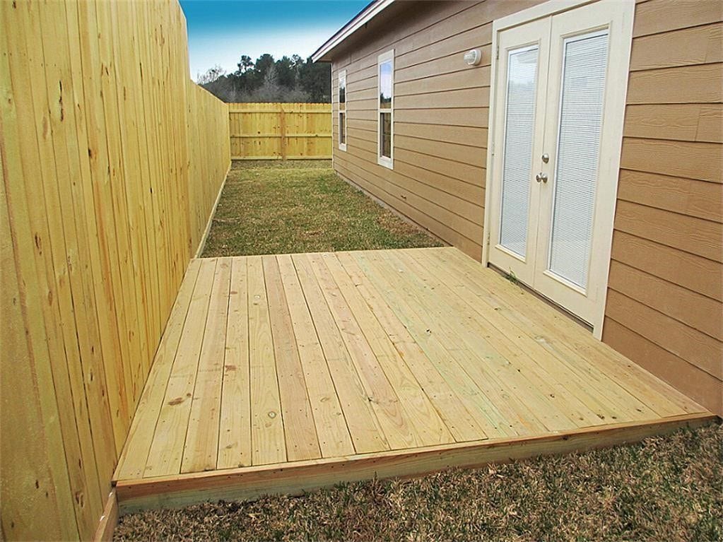 119 South Bend Ct, #A, Willis, TX 77378 Some units have a concrete patio instead of the wood deck.
