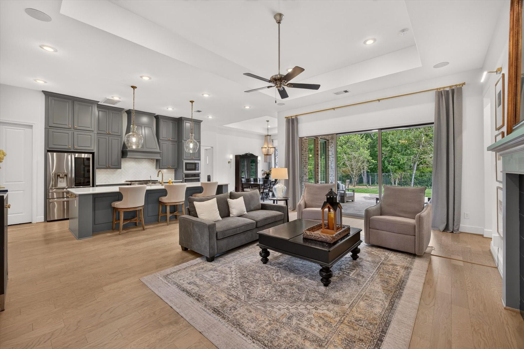 1219 Mcmurtry Ridge Drive, Katy, TX 77494 Open kitchen and large windows in the living area which provide great natural lighting.