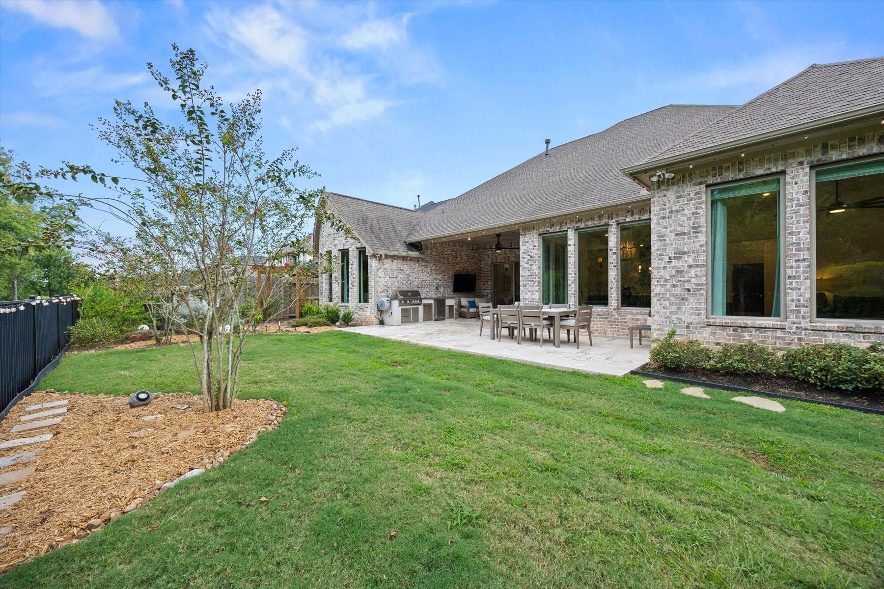 1219 Mcmurtry Ridge Drive, Katy, TX 77494 Peaceful backyard retreat with a covered patio and plenty of room to enjoy outdoor living