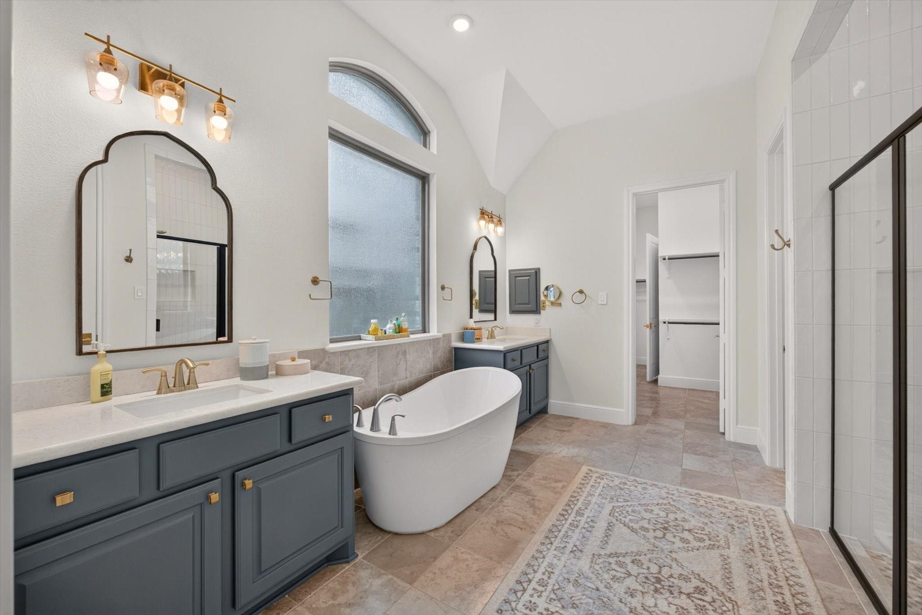1219 Mcmurtry Ridge Drive, Katy, TX 77494 Spa-inspired primary bathroom loaded with luxurious finishes and thoughtful details.