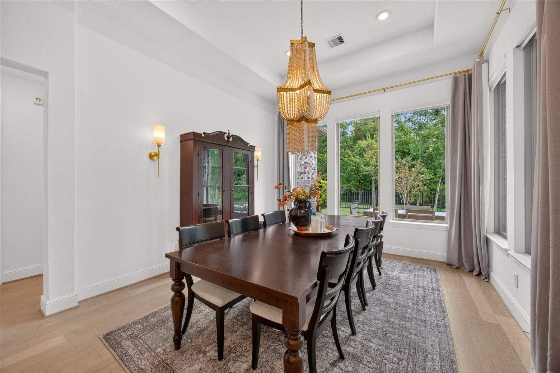 1219 Mcmurtry Ridge Drive, Katy, TX 77494 The formal dining area has soaring ceilings and abundant natural light and is perfect for hosting dinners and special gatherings.